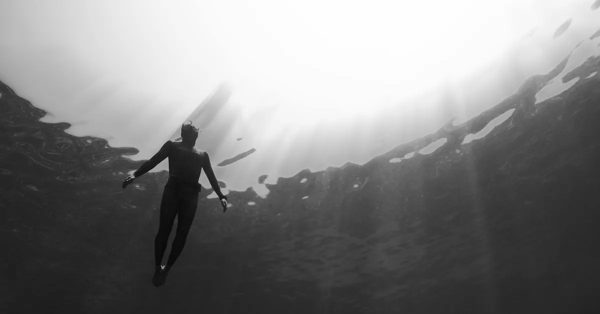 Human Diver in Ocean absorbing Nature